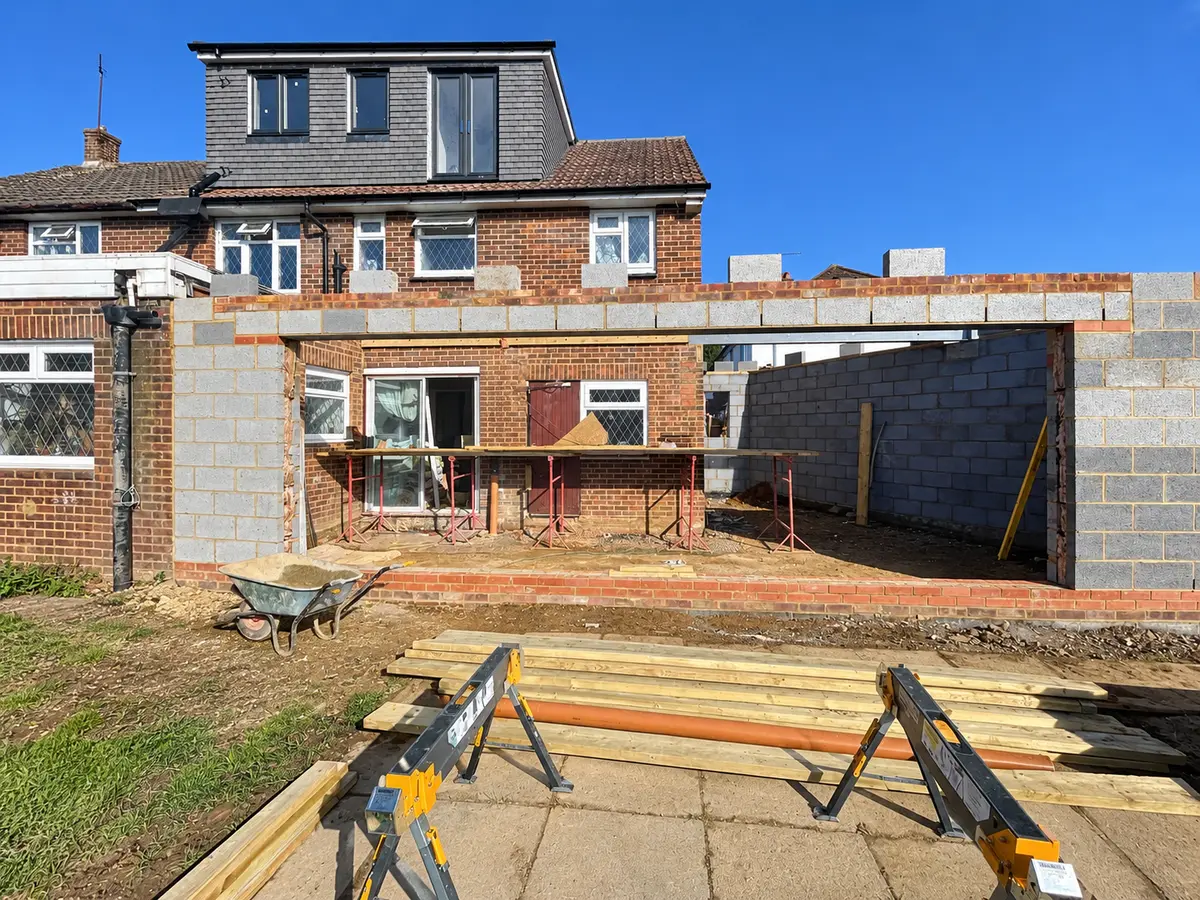 Blockwork stage of the double-storey wraparound extension at Denham